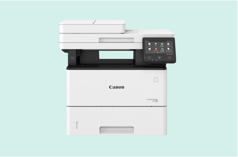 Impresora inkjet compacta de color blanco con cartuchos de tinta visibles, ideal para uso doméstico y pequeña oficina